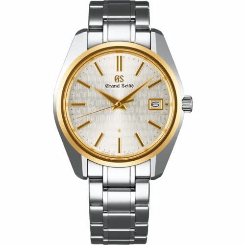 Grand Seiko Quartz Date Stainless Steel / Yellow Gold / Caliber 9F 25th Anniversary Limited Edition SBGV238